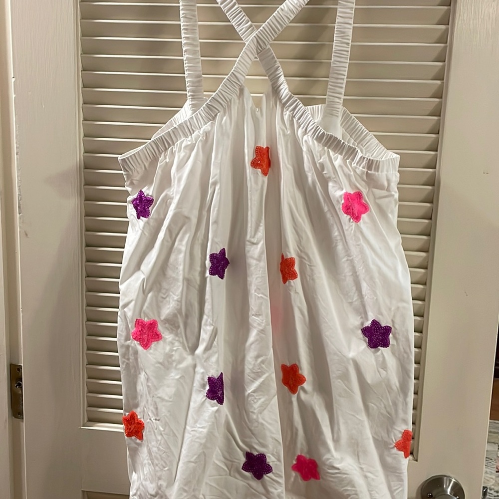 Super cute for summer white mini dress with sequin star detail! L